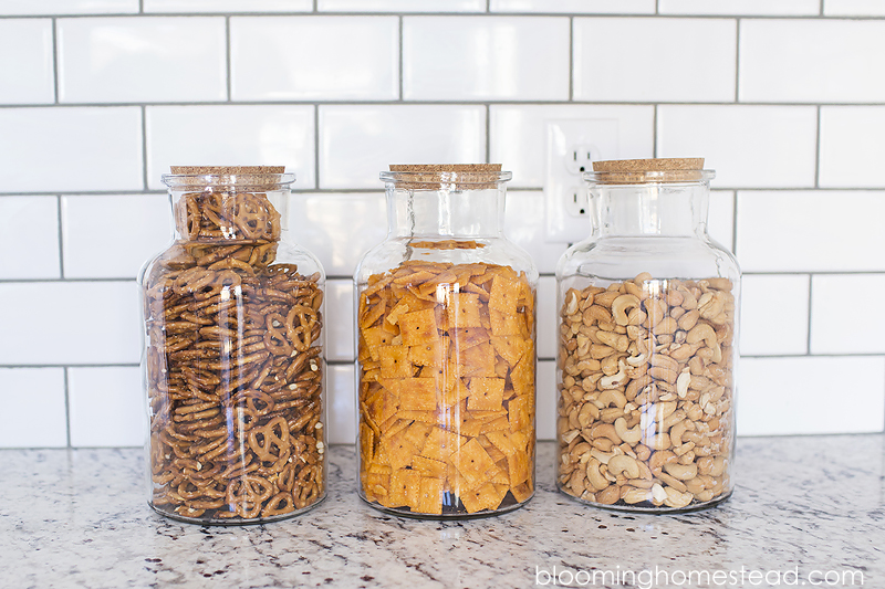 Food Ingredients In Glass Jars On A Kitchen Counter Top. Stock